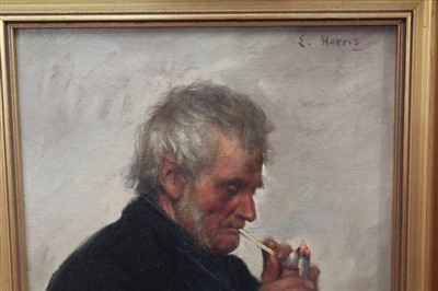 Lot 1141 - Edwin Harris (1855-1906) oil on canvas - portrait of fisherman lighting a clay pipe, signed, in gilt frame, 37cm x 26cm