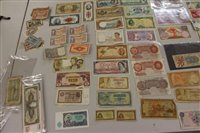 Lot 45 - World – mixed banknotes – to include issues from China, France, Germany, Indo-China, Indonesia, Malta, Singapore, South America and many other countries (N.B. various grades Poor – A.UNC) (175 note...