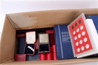 Lot 47 - Accessories in two boxes – to include Whitman coin folders (x 46), plastic coin capsules, sovereign and half sovereign cases and coin albums (qty)
