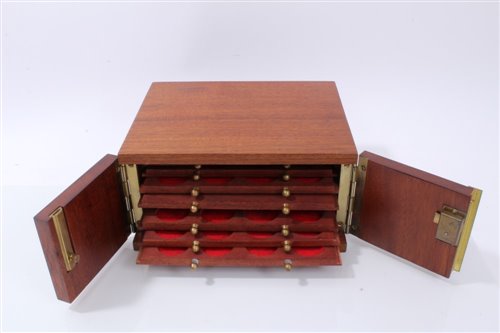 Lot 119 - Coin cabinet – a fine teak coin cabinet containing eight coin trays (N.B. with key) (1 item)
