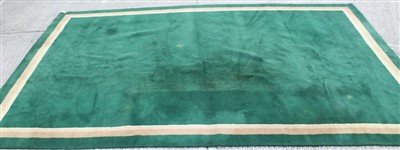 Lot 1677 - Very large Donegal type green wool rug