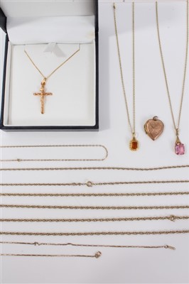 Lot 3296 - Rose gold (9ct) crucifix pendant on chain, together with group of other gold and yellow metal chains