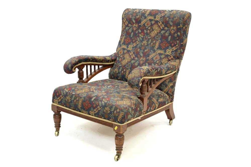 Lot 1313 - Edwardian mahogany easy chair in the manner of Howard & Sons