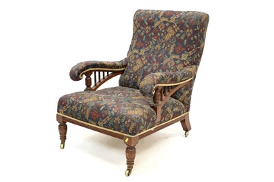 Lot 1313 - Edwardian mahogany easy chair in the manner of Howard & Sons