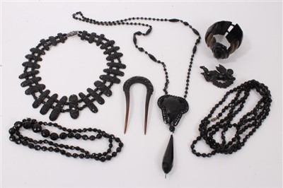 Lot 3264 - Group of French Jet and other Jet including necklaces, carved Cupid brooch, bracelet and hair slide