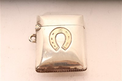 Lot 470 - Victorian silver vesta, rectangular form, inset 9ct gold horseshoe, hinged cover (Birmingham 1898)