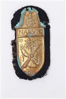 Lot 529 - Nazi Narvik shield Badge with cloth backing