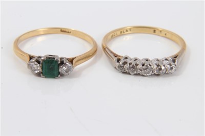 Lot 3228 - Gold (18ct) emerald and diamond three stone ring, together with a gold (18ct) diamond five stone ring, both size O.