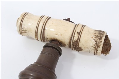 Lot 922 - 19th century bone handled patent screw-handled corkscrew