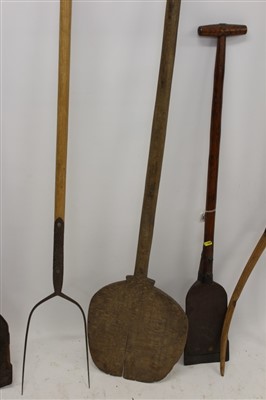 Lot 948 - Two 19th century metal mounted wooden peat cutters
