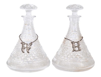 Lot 930 - Pair of cut glass ships decanters with wine labels