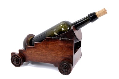 Lot 924 - 19th century mahogany novelty bottle holder in the form of a cannon