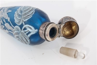 Lot 908 - Late 19th century cameo glass scent bottle, possibly by Webb, with silver mount of teardrop form, together with another similar