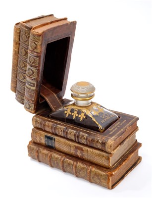 Lot 919 - Faux book decanter box containing decanter bearing the legend ‘Courvoisier the Brandy of Napoleon’