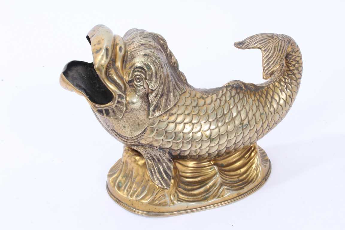 Lot 902 - Victorian gilt metal dolphin form spoon warmer, kite mark to base