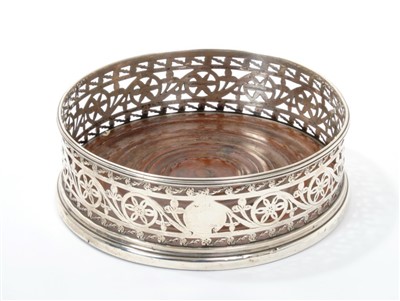 Lot 359 - Early 19th century silver bottle coaster of circular form