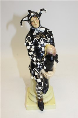 Lot 2105 - Rare Royal Doulton figure - The Jester in black and white chequered tunic HN45