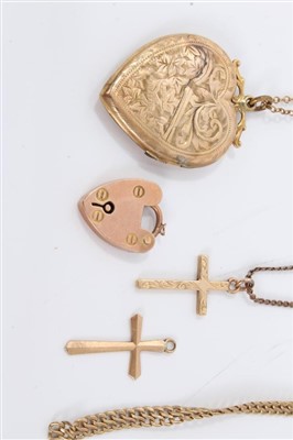 Lot 3234 - Group gold (9ct) jewellery including two cross pendants, chain, bracelet, padlock claps and a heart shaped locket on yellow metal chain