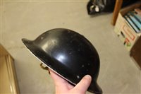Lot 600 - Group of four Second World War British Military MKII Steel Helmets to include Home Front Ambulance Driver and Camouflaged Helmet dated 1939 (4)
