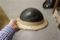 Lot 600 - Group of four Second World War British Military MKII Steel Helmets to include Home Front Ambulance Driver and Camouflaged Helmet dated 1939 (4)
