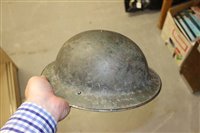 Lot 600 - Group of four Second World War British Military MKII Steel Helmets to include Home Front Ambulance Driver and Camouflaged Helmet dated 1939 (4)