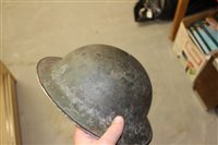 Lot 600 - Group of four Second World War British Military MKII Steel Helmets to include Home Front Ambulance Driver and Camouflaged Helmet dated 1939 (4)