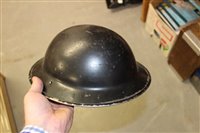 Lot 600 - Group of four Second World War British Military MKII Steel Helmets to include Home Front Ambulance Driver and Camouflaged Helmet dated 1939 (4)