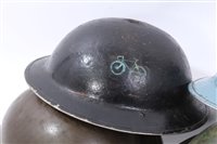 Lot 601 - Group of four Second World War British Military MKII Steel Helmets to include Home Front / Civil Defence and Camouflaged Helmet dated 1939 (4)