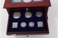 Lot 121 - G.B. Three Decades of King George V – silver coins and postage stamps – to include Crown 1935 and others in four-drawer glass-topped teak cabinet (1 item)