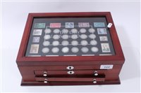 Lot 123 - U.S. a teak two-drawer cabinet with glass hinged top, containing ‘The Last U.S. Silver Dimes’ (x 48), with Certificates of Authenticity (48 coin set)