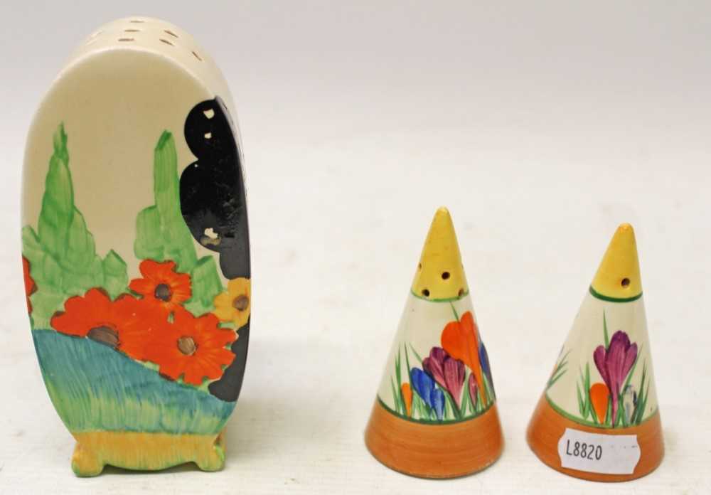 Lot 2002 - Pair of Clarice Cliff Crocus pattern salt and pepper pots and a Clarice Cliff Bonjour sugar sifter (3)