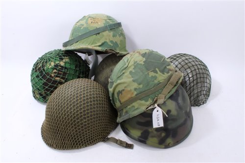 Lot 618 - Collection of military helmets to include American and Australian steel and composite helmets