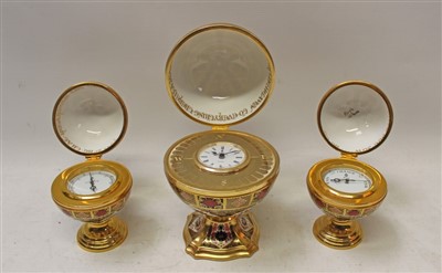 Lot 2023 - Royal Crown Derby limited edition Millennium Globe Clock, commissioned by Sinclairs, Royal Crown Derby limited edition Millennium clock and barometer, all no. 639 of 1000, all boxed with certificat...