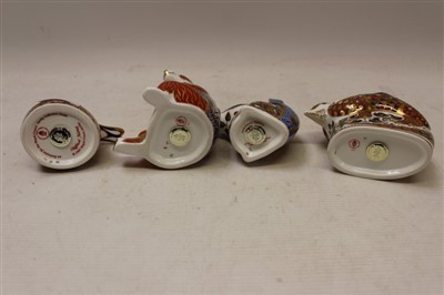 Lot 2031 - Four Royal Crown Derby paperweights – Nesting Chaffinch, Grey Squirrel, Honey Bear and Armadillo, all boxed