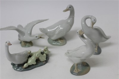 Lot 2067 - Four Lladro porcelain geese and one other Nao goose (4)