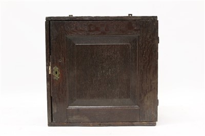 Lot 1650 - 18th century oak spice cupboard with six internal drawers
