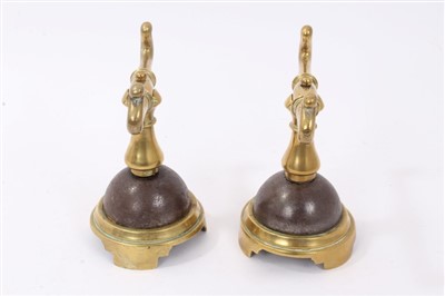 Lot 869 - Pair of Victorian brass fire dogs in the manner of Christopher Dresser