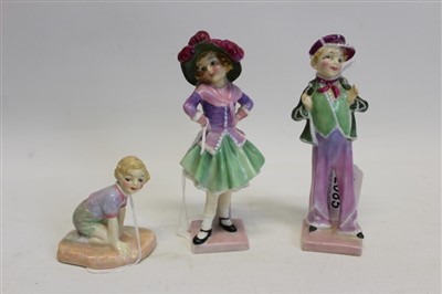 Lot 2085 - Three Royal Doulton figures – Pearly Boy HN1547, Pearly Girl HN1548 and Robin M39