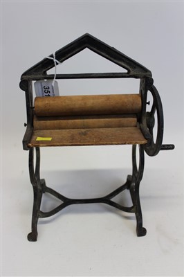 Lot 3518 - Miniature mangle with cast iron frame and wooden rollers, 28cm overall height