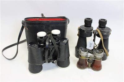 Lot 211 - Pair Bino Prism no. 5 MkIV x7 Second World War binoculars, pair V Omegon binoculars in fitted case and a pair early 20th century opera glasses (3)