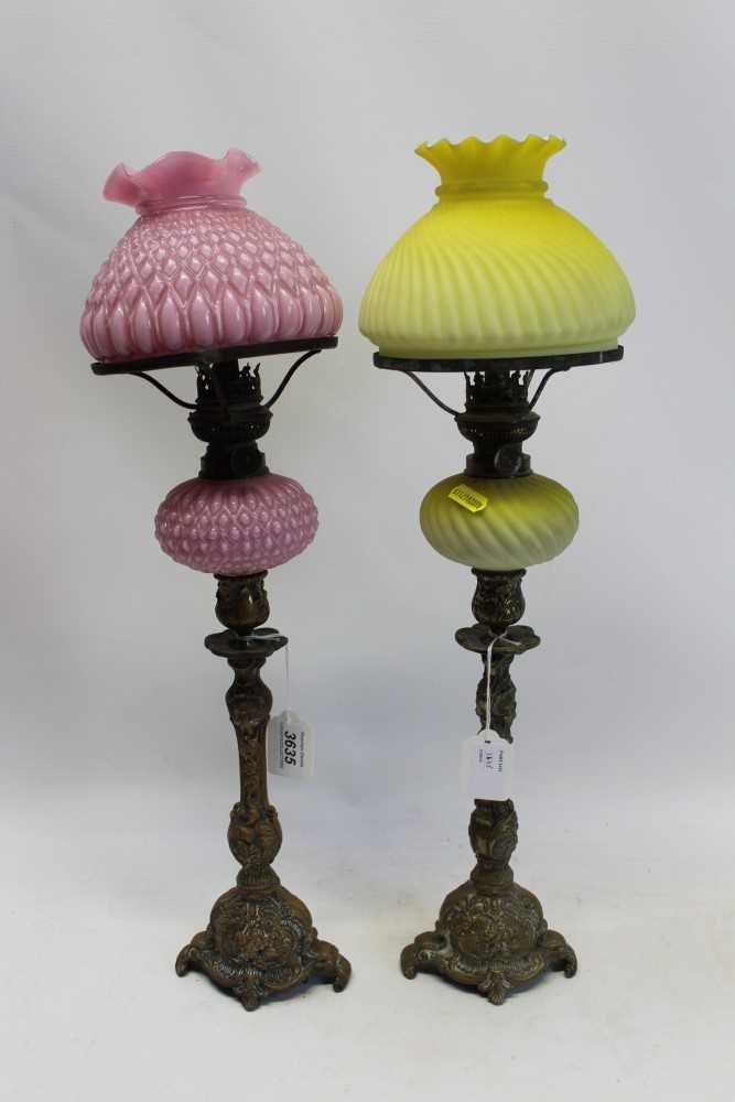 Lot 3635 - Two coloured glass oil lamps