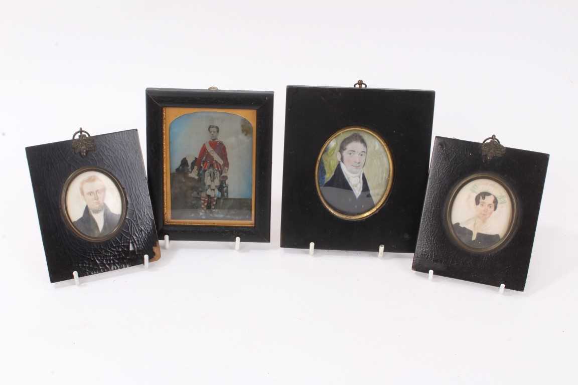 Lot 963 - Four 19th century portrait miniatures
