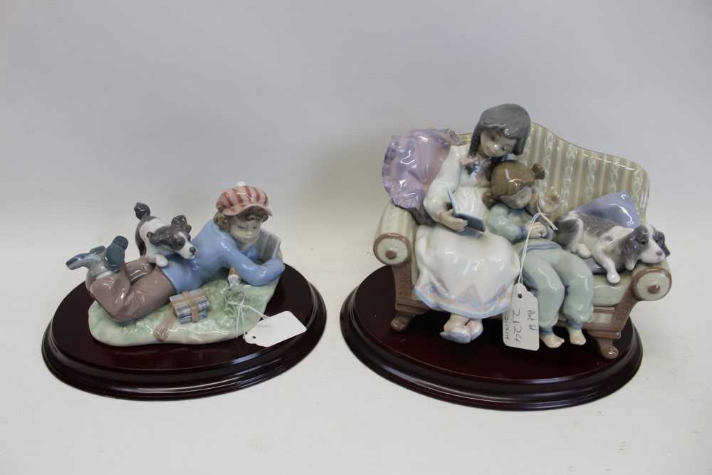 Lot 2124 - Two Lladro porcelain figures - Big Sister and Study Buddies