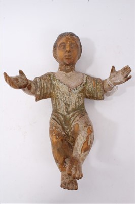 Lot 996 - Painted and carved putti figure