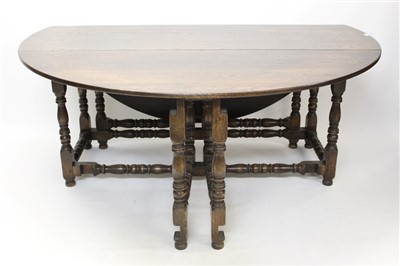 Lot 1536 - Oak double gateleg drop leaf dining table