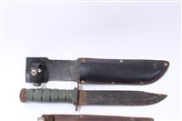 Lot 812 - American fighting knife with plastic grip and Bowie type blade, together with a old knife with wooden grip and steel blade by William Rogers, Sheffield, together with two other knives (4)