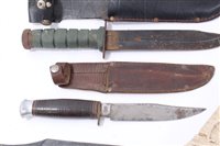 Lot 812 - American fighting knife with plastic grip and Bowie type blade, together with a old knife with wooden grip and steel blade by William Rogers, Sheffield, together with two other knives (4)