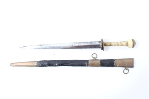 Lot 818 - Georgian Naval Midshipman’s Dirk, with brass disc cross guard, tapered ribbed Ivory hilt, with brass lions head pommel and tapered steel blade, in black leather scabbard with brass mounts