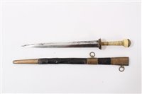 Lot 818 - Georgian Naval Midshipman’s Dirk, with brass disc cross guard, tapered ribbed Ivory hilt, with brass lions head pommel and tapered steel blade, in black leather scabbard with brass mounts