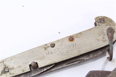 Lot 843 - First World War Canadian folding military pocket knife, marked M&D Canada, 1914, together with a Second World War Navy clasp knife by Joseph Rogers (2)